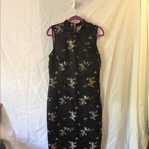 Black satin long Asian dress.